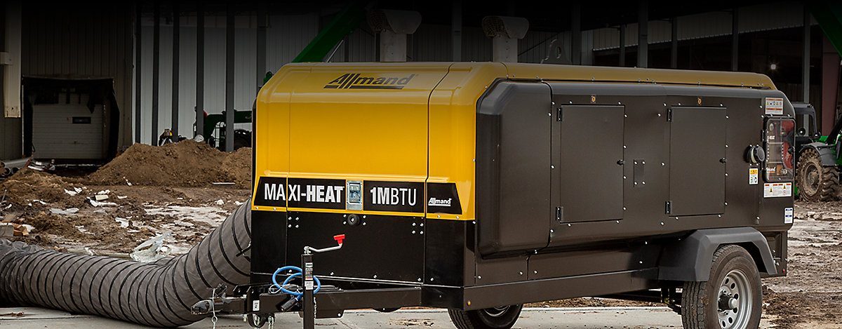 A heater running with ducting attached on an oilfield work site
