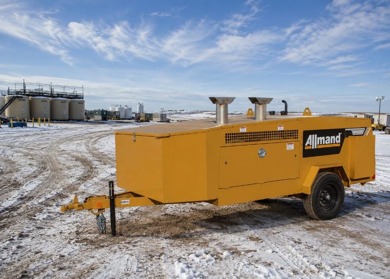 Allmand Maxi-Heat indirect-fired heater on a snowy oilfield