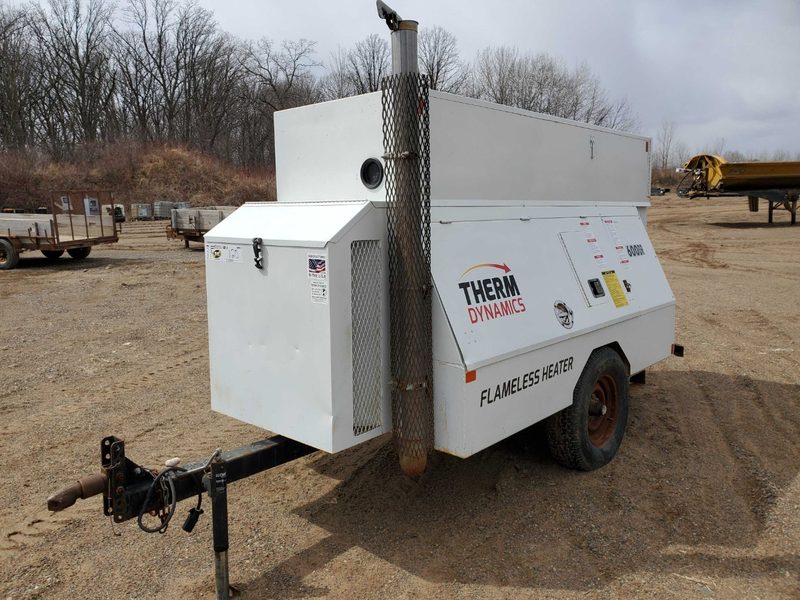 Therm Dynamics TD1200 flameless heater on a snowy oilfield yard